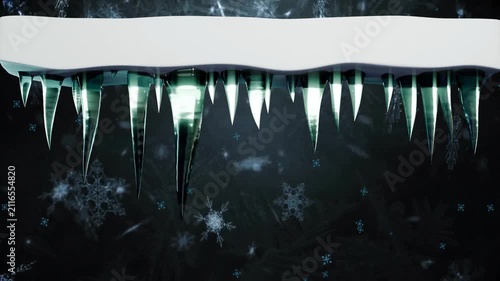 Temperature dropping causing snow ledge growing icicles while green glints sliding down