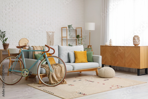 Cozy sofa with cushions, pl...