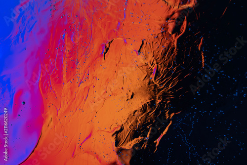 Cuadro en lienzo Abstract orange blue liquid texture with spreading droplets