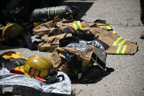 A Fire Engine Display showing the equipment firemen use to stay safe and respond to fires looking at Personal Protective Equipment worn to fight fires