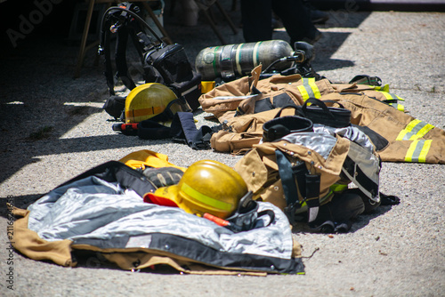 A Fire Engine Display showing the equipment firemen use to stay safe and respond to fires looking at Personal Protective Equipment worn to fight fires