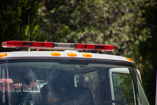 A Fire Engine Display showing the equipment firemen use to stay safe and respond to fires looking at the emergency light bar