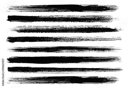 A white background with black grunge brush stroke lines, isolated and ready for use