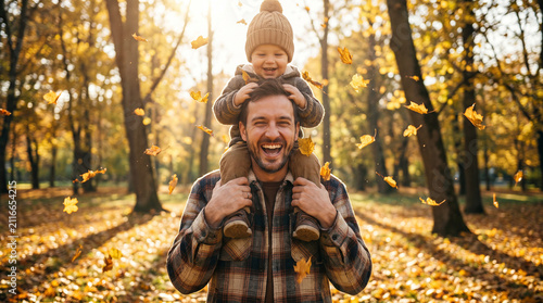 A beautifully detailed photorealistic stock photograph capturing an authentic everyday lifestyle moment of a loving dad carrying his happy toddler in a sunny autumn park.