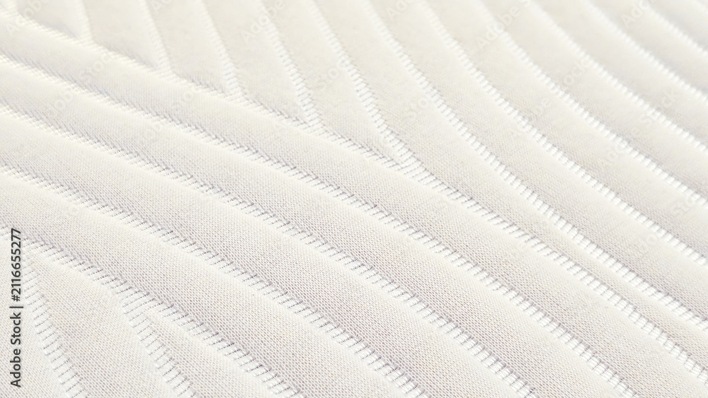Obraz premium white quilted mattress fabric texture close-up background