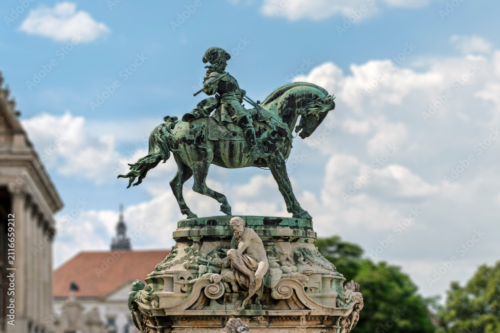 Fototapeta premium Bronze equestrian statue of Prince Eugene of Savoy on a rearing horse at Buda Castle overlooking the city in Budapest, Hungary