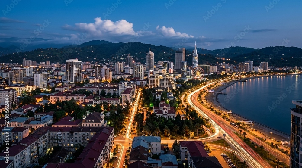 Fototapeta premium Batumi skyline with coastal road at dusk, Georgia