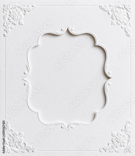 Elegant embossed paper background with an ornamental vintage frame and decorative border