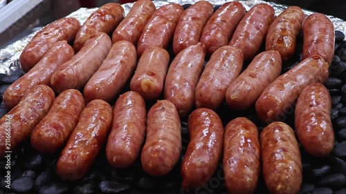 Grilled Pork Sausages Roasting on Charcoal at Night Food Market. Close Up of Traditional Barbecue Snack, Hot Fresh Street Food, Outdoor Festival Catering