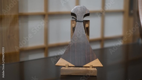 Traditional wooden plectrum for japanese biwa lute, close up