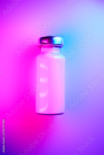 Medicine vial representing weight loss innovation and health breakthrough