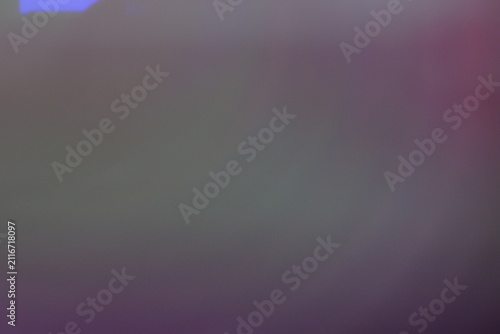 Quadro su tela Abstract dark colorful blurry bokeh gradient background with purple light