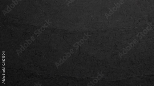 High resolution close-up of dark black handmade paper featuring visible natural fiber strands and delicate organic texture. Ideal for luxury branding, minimalist graphic design, artistic invitations