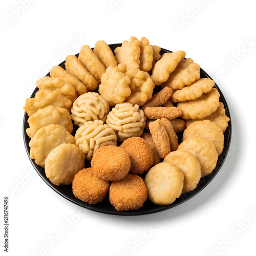 Assorted Traditional Cookies on Black Plate for Snack Time.