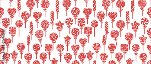 Foto Seamless Pattern of Red and White Swirl Lollipops