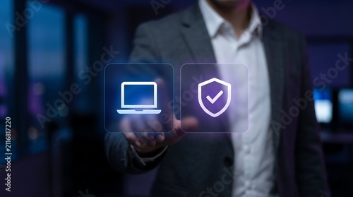 Business executive interacting with digital laptop and security shield icons for protected remote work and cybersecurity management