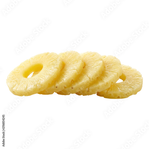 Fresh pineapple slices stacked on white background