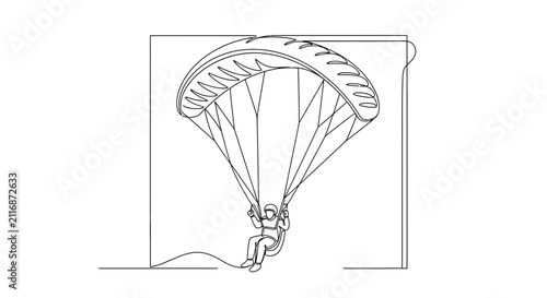 paraglider flying in air