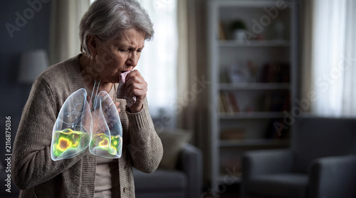 Senior woman coughing with lung pain. Elderly person suffering from respiratory illness.