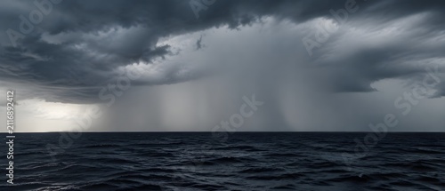 Heavy Rain Curtain Forms Solid Gray Wall Across Horizon Above A Dark Dramatic Ocean Scene
