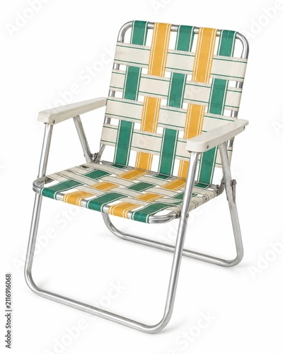 Folding camping chair with retro geometric pattern design. Portable outdoor seating for picnics, beaches, and festivals in vibrant colors