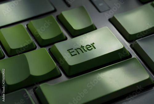 Green enter key on a dark c...