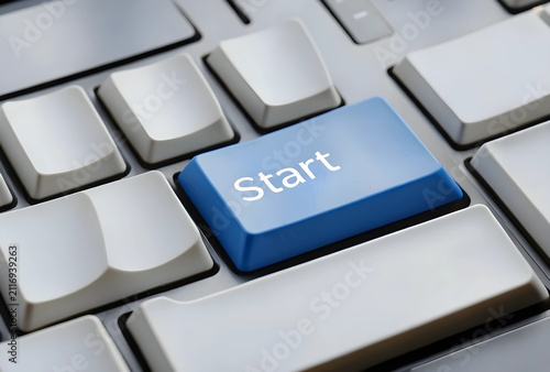 Blue start button on a comp...