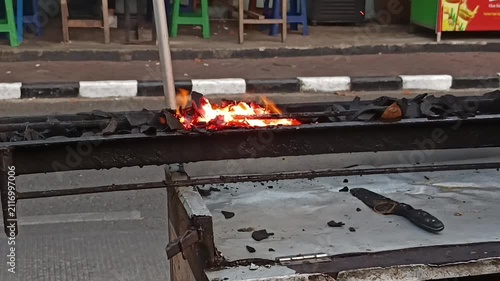 Traditional Indonesian Satay Grill Video Footage with Glowing Charcoal Fire, Skewered Meat Cooking, Street Food Barbecue, Authentic Culinary Experience