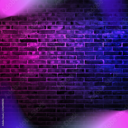 Vibrant neon brick wall backdrop with pink purple and blue lighting dramatic smoke glowing corners dark urban texture and empty center space for music posters events banners and creative displays