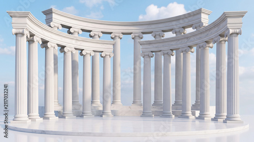 Classical architecture with white marble columns arranged in a semicircle on a podium against a clear blue sky background