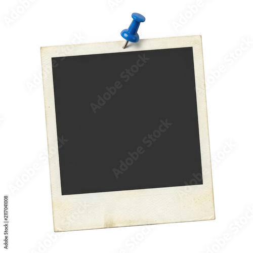 Old vintage polaroid photo frame attached with a blue push pin