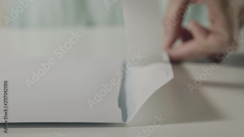 Closing a white envelope