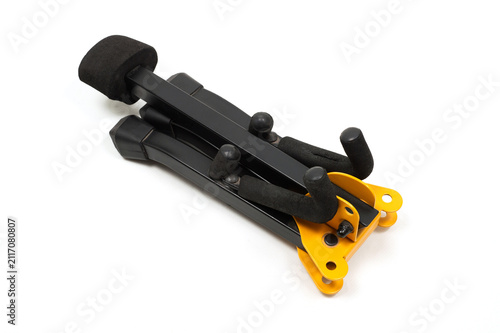 Sturdy black folding metal guitar stand.
