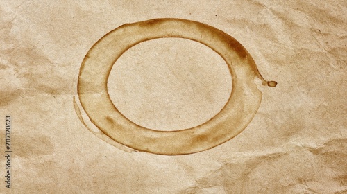 Macro of coffee cup stain on kraft paper.