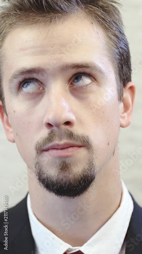 Businessman rolls eyes in slow motion