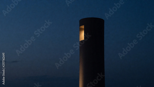Biochar Municipal Water Filtration Tower Silhouetted at Twilight