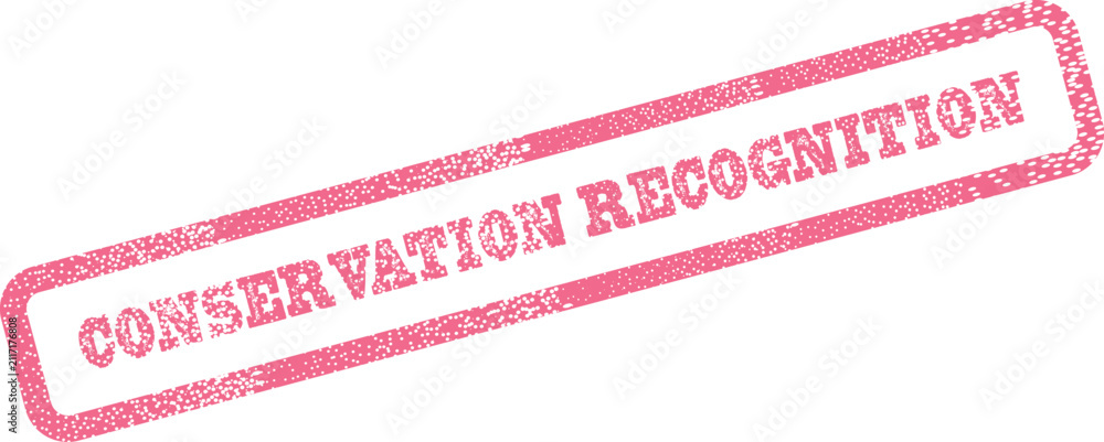 Foto Authentic pink ink rubber stamp impression symbolizing conservation recognition