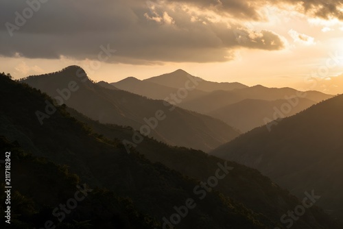 Sunset light illuminating a mountain landscape