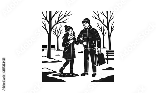 Couple walking in winter park.