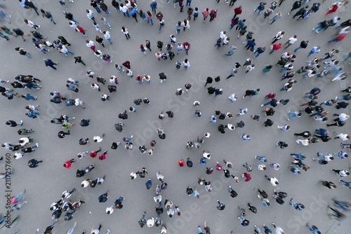 The Overhead Crowd of People Spreading Across a Busy Plaza
