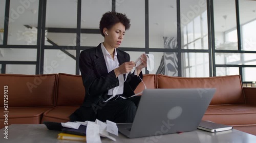 Worried Entrepreneur Reviewing Receipts and Business Expenses