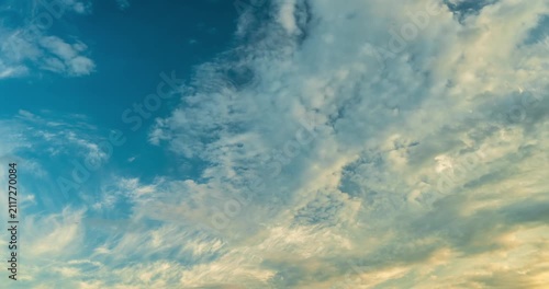 Beautiful twilight sky with fluffy white cirrus and cumulus clouds time lapse