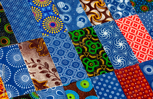 Diagonal patchwork collage of South African shweshwe fabric patterns