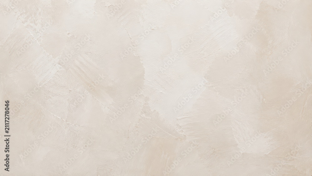 Fototapeta premium A Soft Neutral Beige Plaster Wall Surface With Visible Textured Brush Strokes