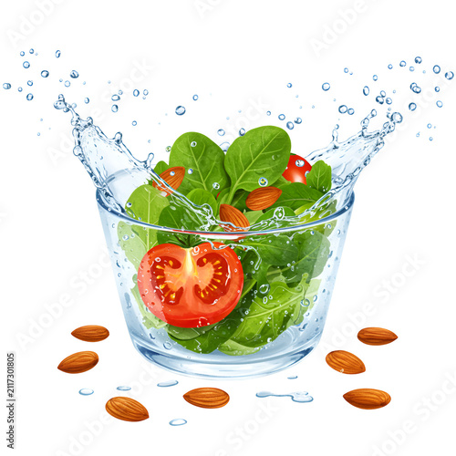 Fresh Salad Splash: A vibrant mix of fresh spinach, juicy tomatoes, and crunchy almonds is tossed in a clear glass bowl with a refreshing splash of water.