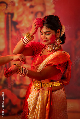 Portrait of Bengali married women celebrating Durga Puja