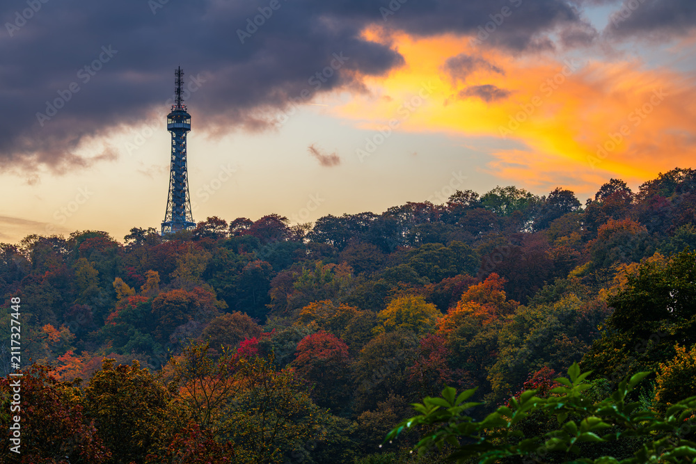 Obraz premium The Petrin lookout tower in UNESCO city site Prague in autumn morning sunrise dawn.