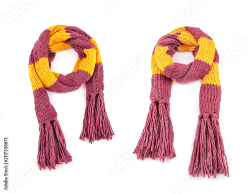 Fotografie Knitted scarf on a white background.