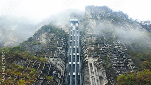 The Massive Sightseeing Elevator At The Three Natural Bridges, UNESCO World Heritage Site In Wulong, Chongqing, China. Tilt-up Shot