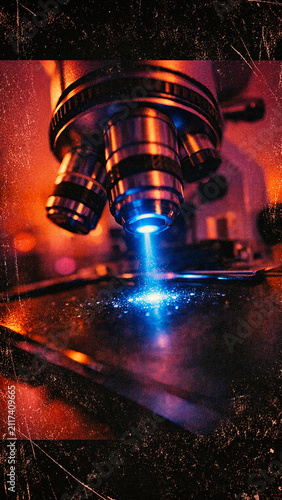 High-resolution view through microscope lens with illuminated object under observation.